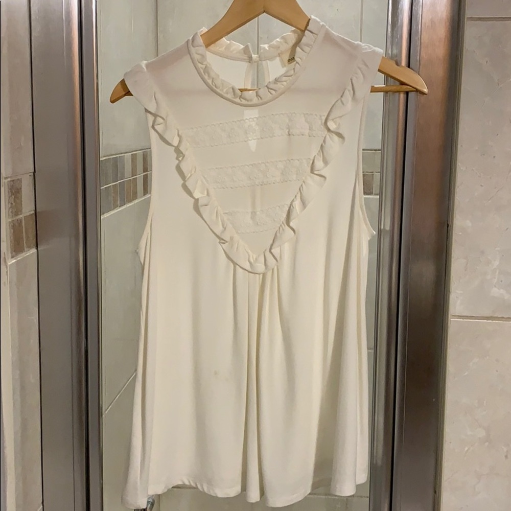 Everleigh cream sleeveless top.